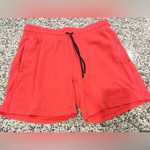 Fabletics Men's Coral-Red Athletic Shorts with Black Drawstring, size Large